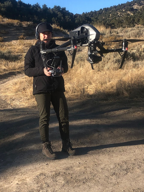 Denver Drone Operator, Professional Drone Services in Denver, Colorado - expertise in film, television, streaming, broadcast, live events - professional drone operator flying the DJI Inspire 2 in the mountains on a television commercial shoot