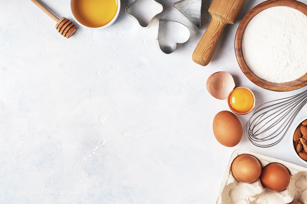 Ingredients for baking - flour, wooden spoon, rolling pin, eggs. Top view, copy space._edited.jpg