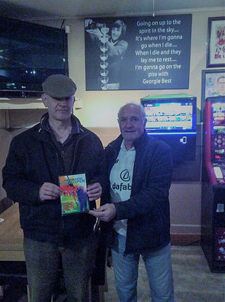 Gerald "Ollie" Lynch presenting Clive Hathaway Travis a signed copy of Jim McCann's book And the Gates Flew Open, the Burning of Long Kesh about the CR gas attack by us on the PIRA in 1974