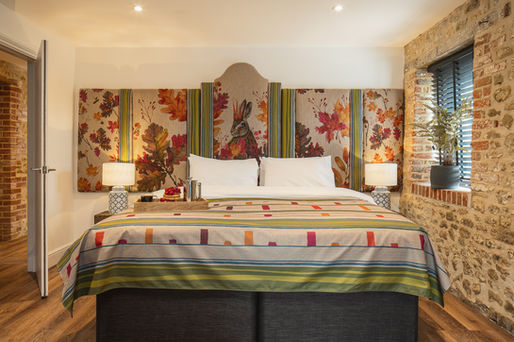 bespoke designed headboard with hare illustration and autumnal theme