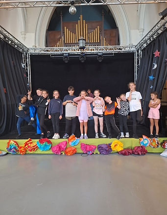 Children from Forget Me Knot Residents Association on stage