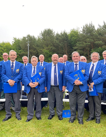 Ashington & District Male Voice Choir wearing blue blazers