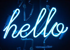 A neon blue sign saying 'hello'