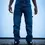 Thumbnail: Front view of a person in blue jeans and brown shoes, standing on pavement.