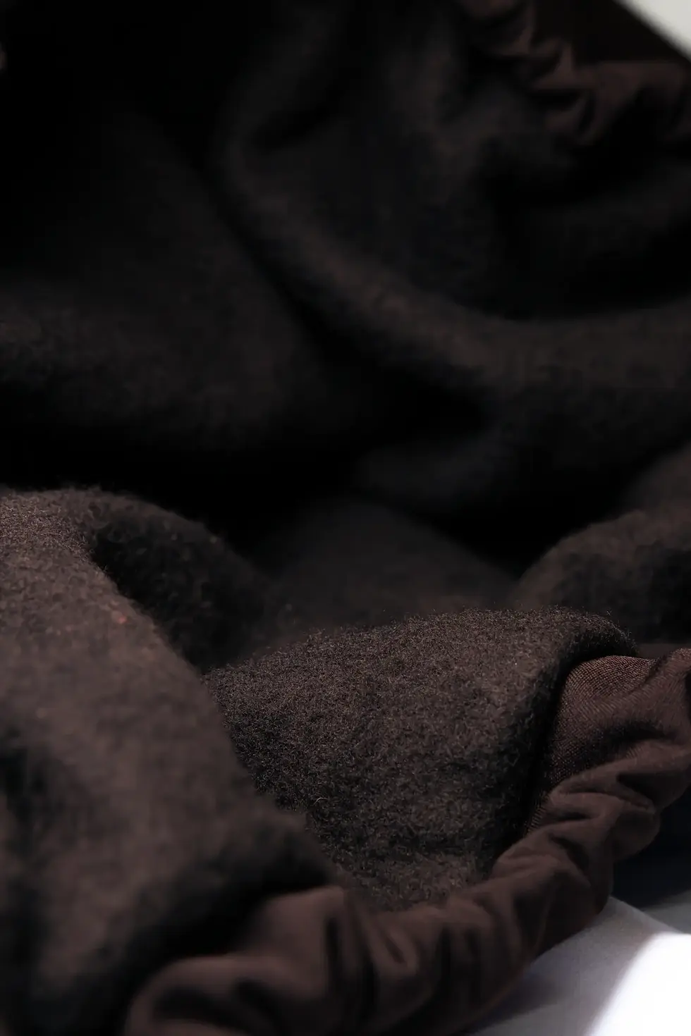 Thumbnail: A rich, textured shot of the inner fleece lining, built for warmth and comfort.