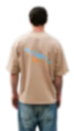 Back view of model wearing the Pool-Tee, highlighting large graffiti-style print on beige fabric.