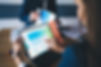 Cropped image of female professional checking financial website with revenue statistics an