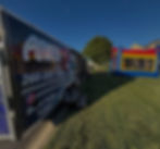 Church event featuring the Power Play Mobile Gaming trailer and a bounce house in Fort Wayne.