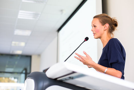 Woman public speaking | ARC Performance Nutrition