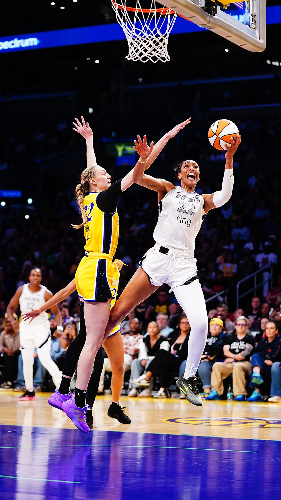 Cameron Brink contest an A'ja Wilson layup on July 29th in Staples Center. Photo by Tyler Ross