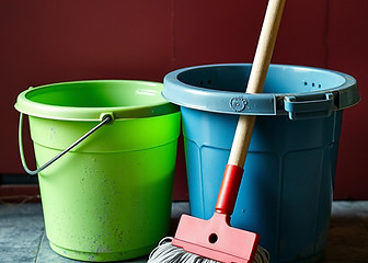 image of mop buckets and mop