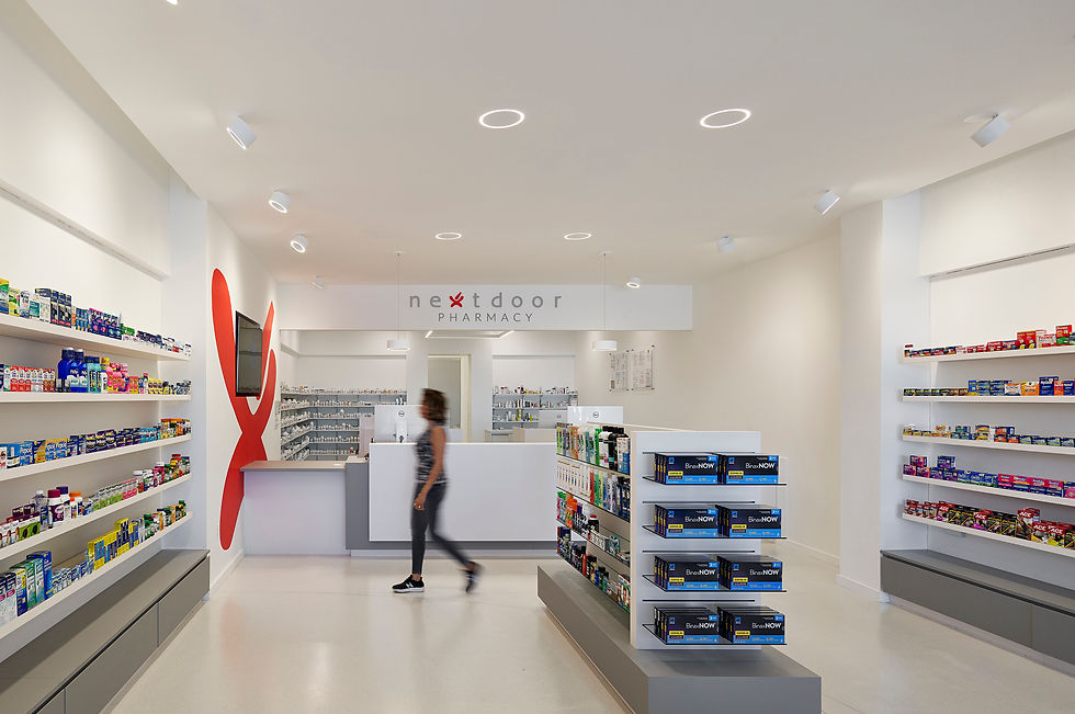 Wondering why a pharmacy needs to look and feel like every other pharmacy led Nextdoor to an epiphany. The independent Baltimore pharmacy focuses on delivering customized services, so they broke from the status quo to offer a unique, second to none experience.
Critical to this concept, the space offers a fresh take on the classic typology of the pharmacy by dissolving the delineation between over-the-counter and prescription areas. Visual connectivity between pharmacists and patients facilitates the mission to provide friendly, fast and personalized service.
The minimalist architecture of the store declutters the otherwise busy visual impact of the many displayed products. A playful yet simple lighting scheme, a customized micro terrazzo floor and floating millwork complete the look and feel.
This pharmacy project includes components of retail, workplace and healthcare programs under one small efficient footprint.
