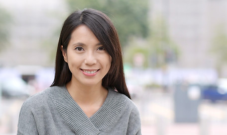 Woman in Grey Sweater