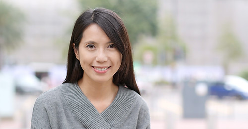 Woman in Grey Sweater