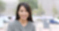 Woman in Grey Sweater