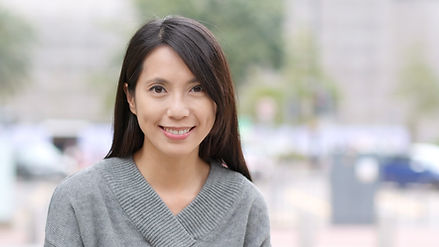 Woman in Grey Sweater