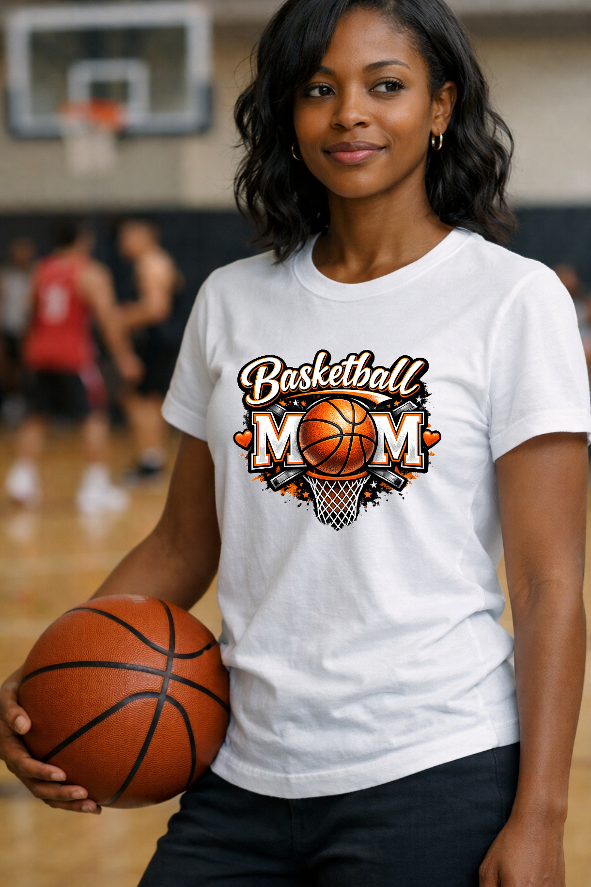 A basketball going through a hoop net, framed by two large silver M letters and script reading Basketball.