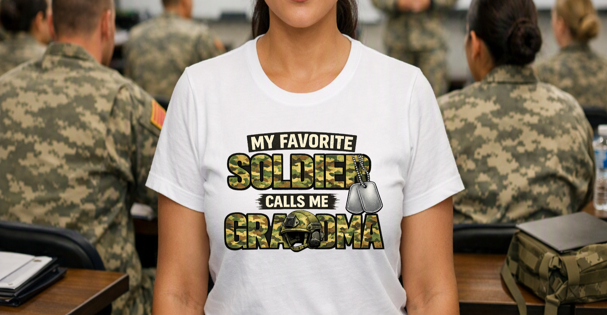 A white military shirt featuring a camouflage soldier helmet, dog tags, and “My Favorite Soldier Calls Me Grandma” design