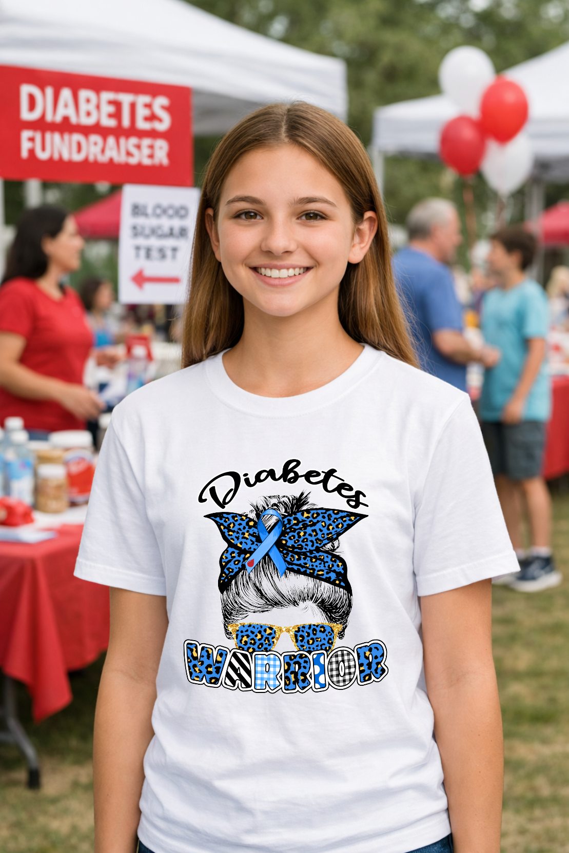 A young woman smiling while wearing a shirt featuring a messy bun graphic with a blue leopard bow and ribbon.