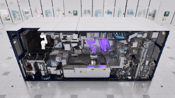 Inside view of a high-tech machine with moving parts and purple lights, set in a sleek, modern laboratory. Machinery details and control panels visible.