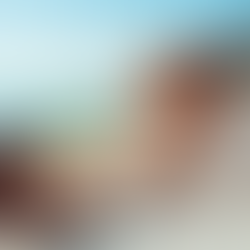 Woman holds tablet showing "NO TAX." Open suitcase with money, passport on table. Relaxed mood.