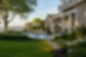 Landscape speaker system providing distributed outdoor audio throughout a Colts Neck backyard