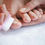 Thumbnail: Woman relaxing with healthy feet after using Healthy Nails Rx for nail fungus treatment.