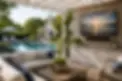 Backyard display in East Hampton with partial sun exposure near pool seating area