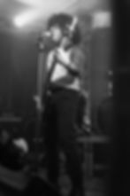 Musician performing live at the Undergoth Festival.