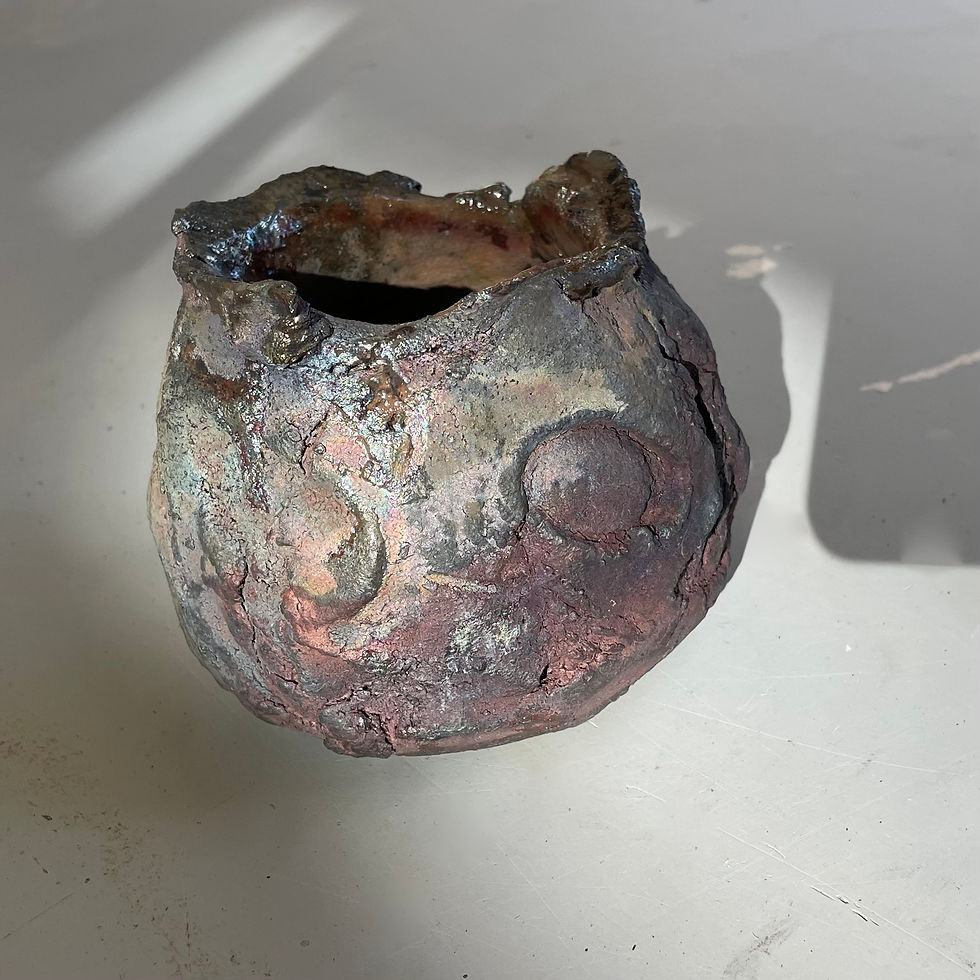 Raku fired pot, stick thrown ceramic matt finish front view.jpeg