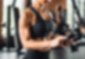 Woman using fitness app in the gym.jpg