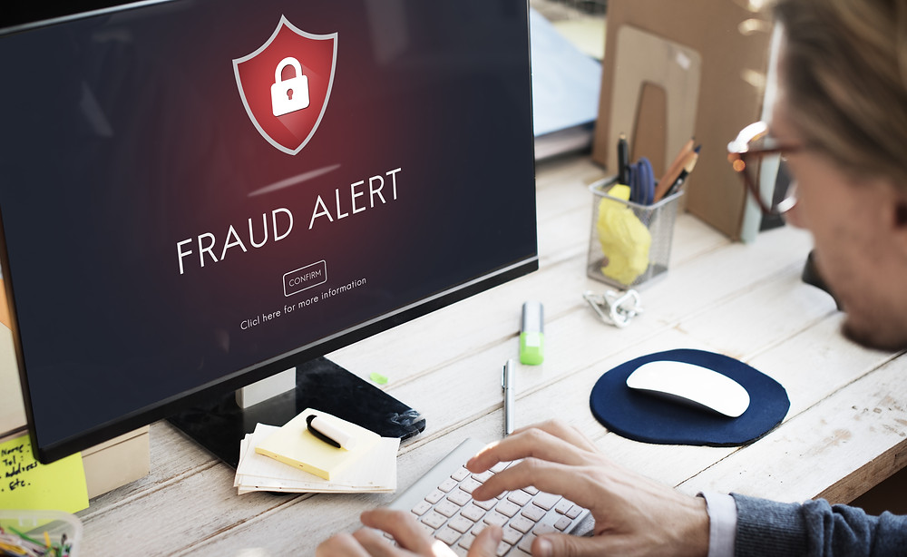 Computer screen with Fraud Alert