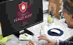 Computer screen with Fraud Alert