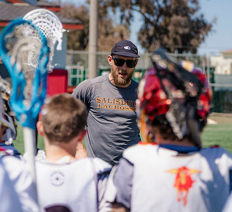 Coach Phipps going over offensive instructions at a training session