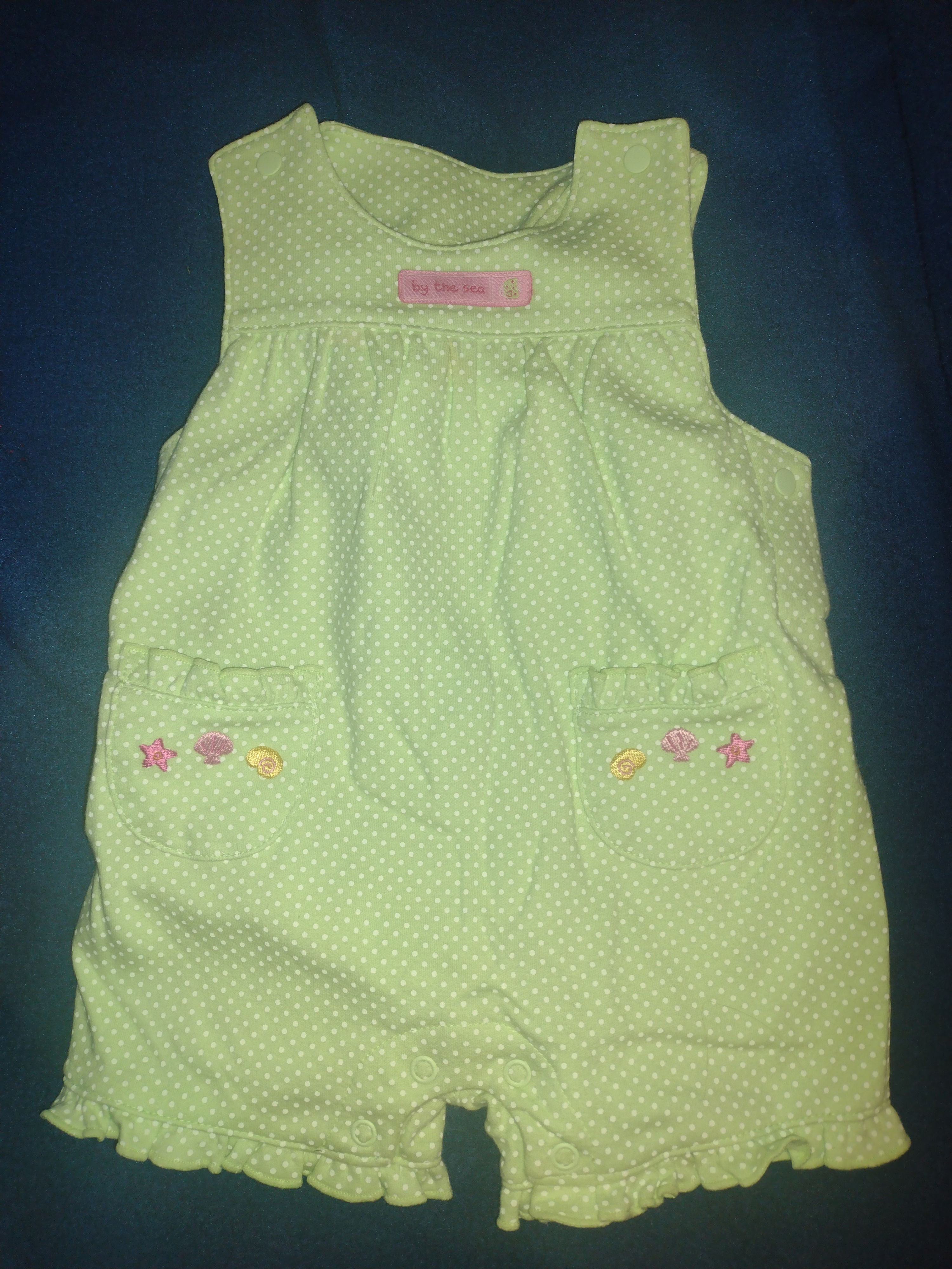 Baby girl green and white polka dot romper with embroidered seashells 