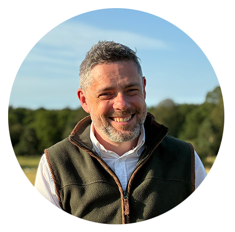 Photo of Jonathan Abbott, Director of Abbott Land and Planning, standing outside in the countryside