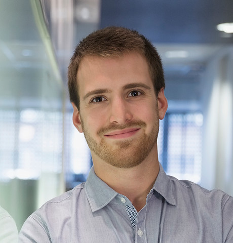 Young Man Smiling in the Office
