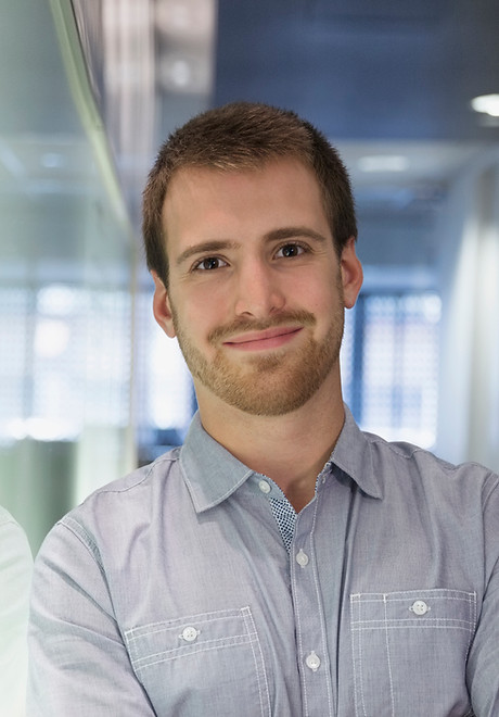 Young Man Smiling in the Office