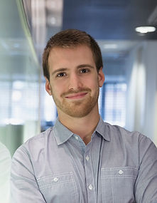 Young Man Smiling in the Office