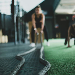 A lady working out a gym