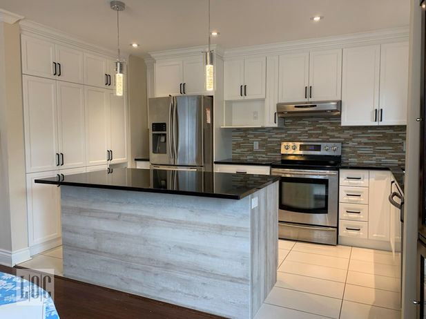 kitchen with white cabinets and horizontal wood grain island