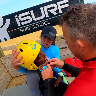 iSurf putting on helmet Sandown Isle of Wight Wave Project