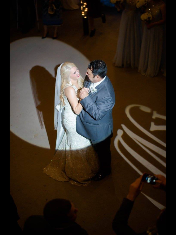 Bride and groom dancing at their wedding reception