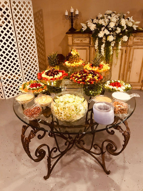 Elegant catering buffet with fresh fruit and appetizers