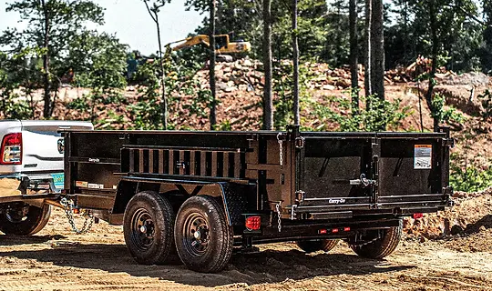 dump-trailer-product-image2-6x12dumplp10k-truck-driving-dump-trailer.jpg.webp