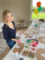 Bronagh, the owner of creative fireflies preparing a workshop