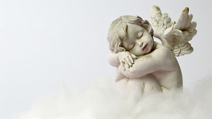 angel-sleeping-on-the-cloud-picture-id889563884 (1).jpeg