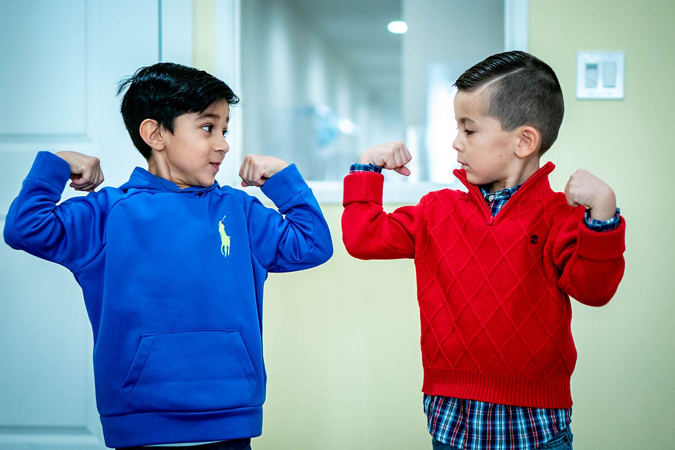 Children flexing their biceps