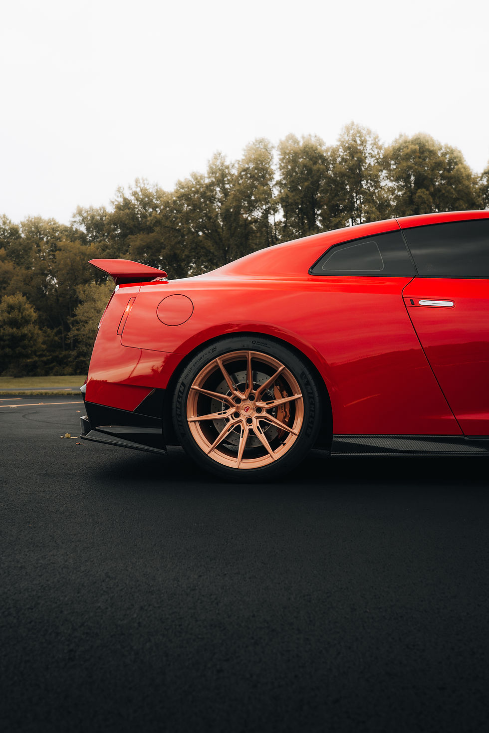 nissan gtr r35 with carbon fiber side skirts front lop copper vossen wheels ppf upgrades by premier custom paint and collision