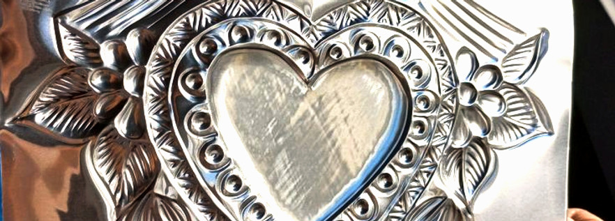 Photo of handmade Mexican tin art - Repujado